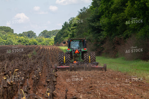 Tractor Mowing Down Sunflowers 79077
