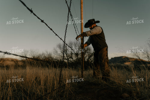 Putting up Barbed Wire Fence 58275