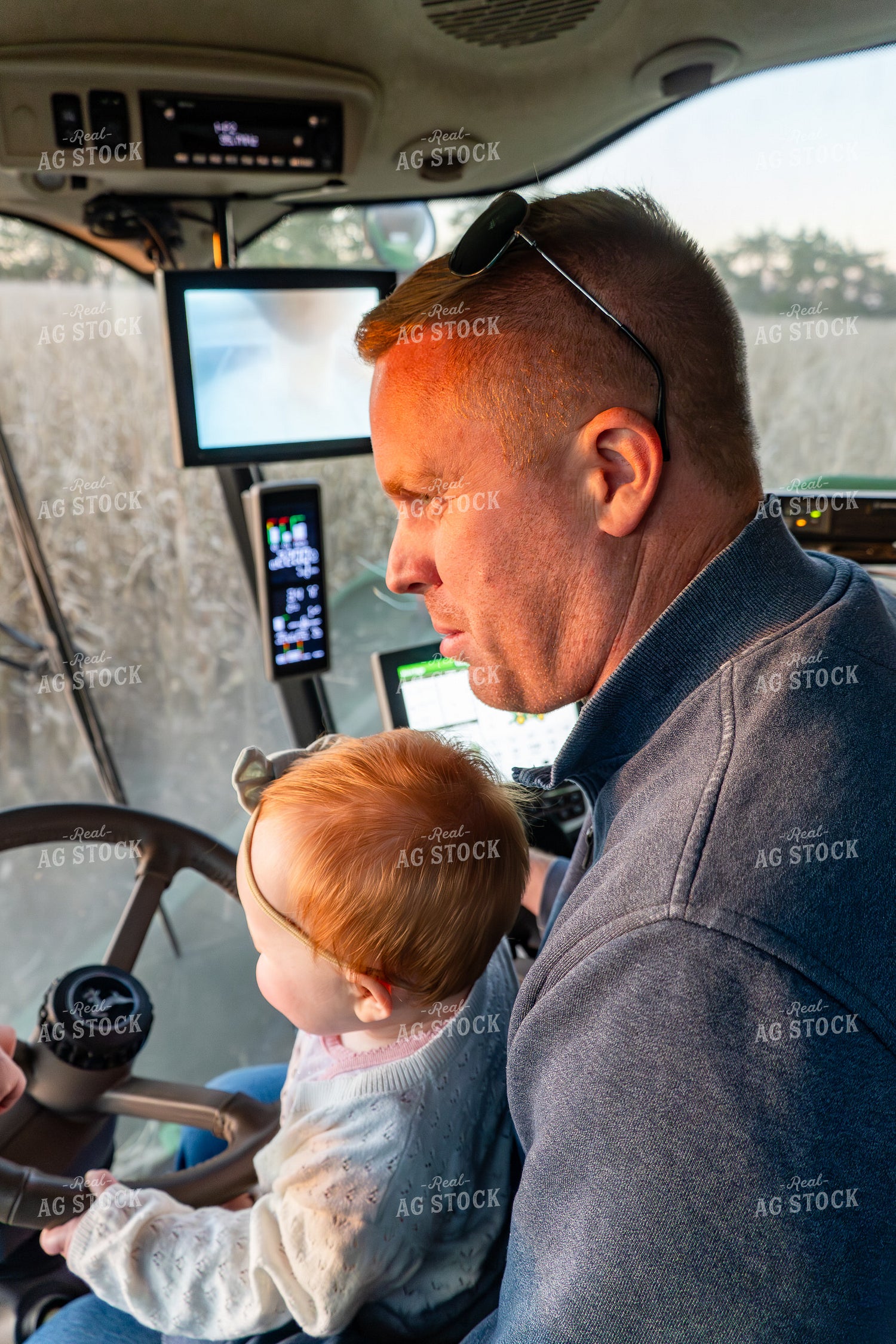 Farm Kid with Farmer in Combine 65551