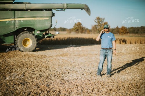Farmer on Phone in Field 7141