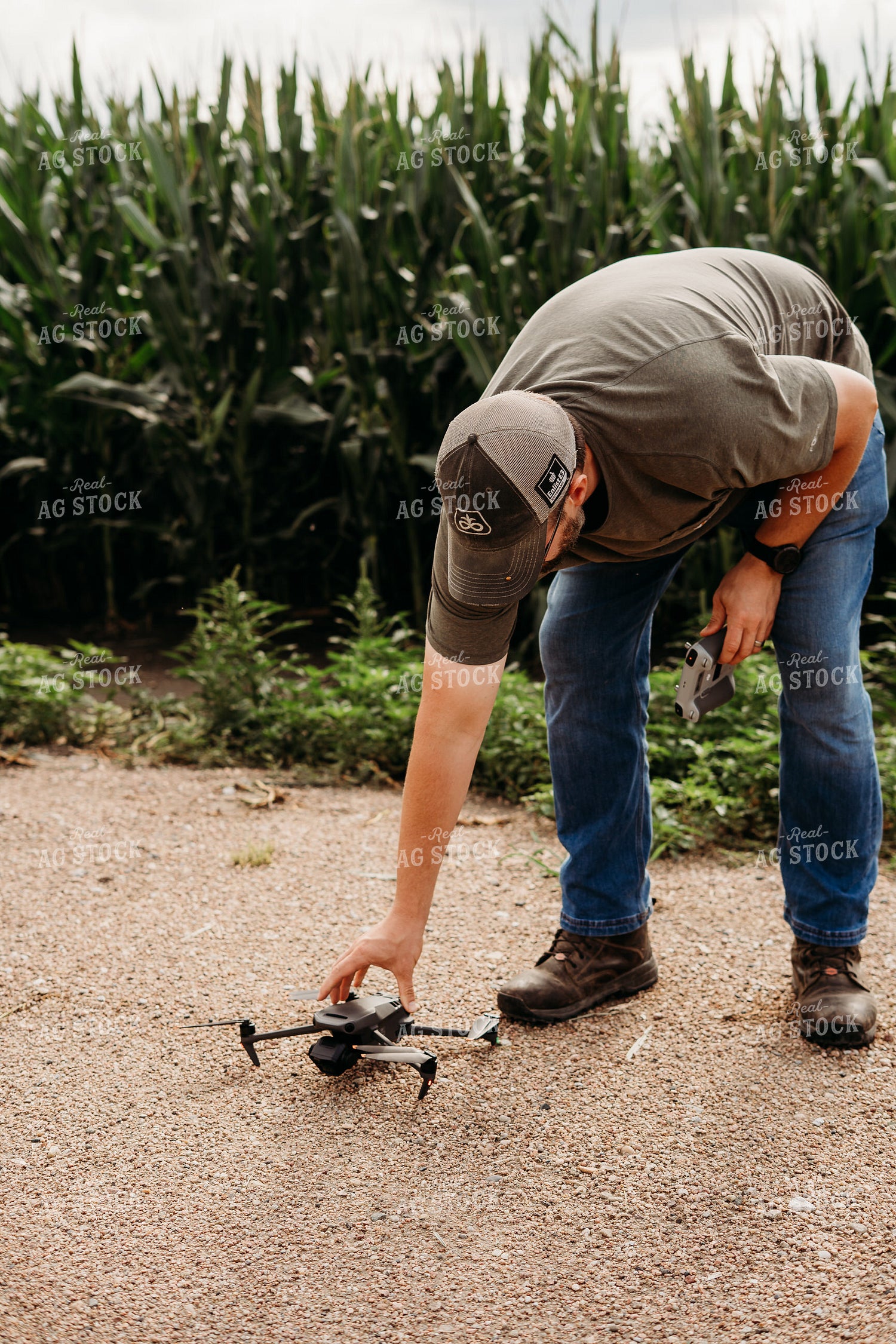 Farmer Holding Drone 196343