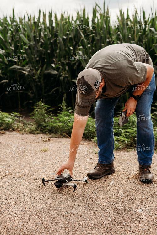 Farmer Holding Drone 196343