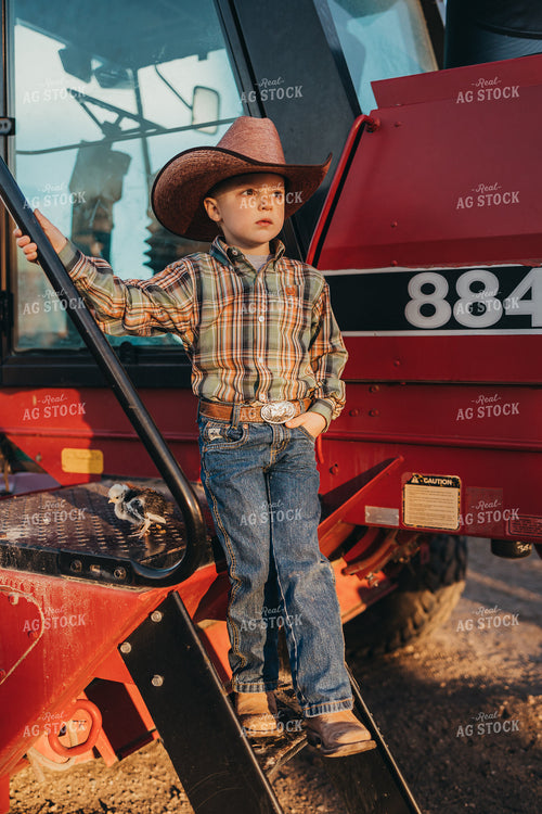 Farm Kid on Hay Mower Ladder 61143