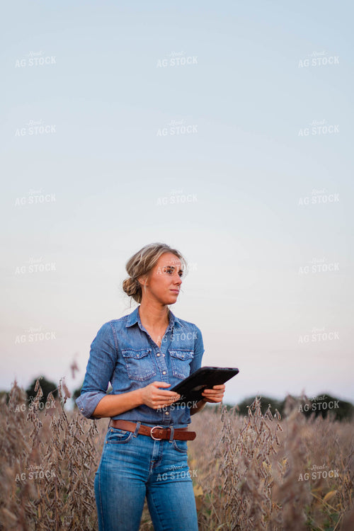 Female Farmer on Tablet in Field 8373