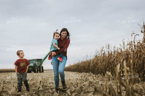 Female Farmer and Kids Walking Away from Tractor 8610