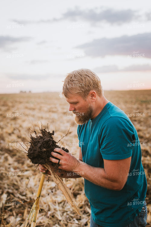 Farmer Checking Root Ball 9405