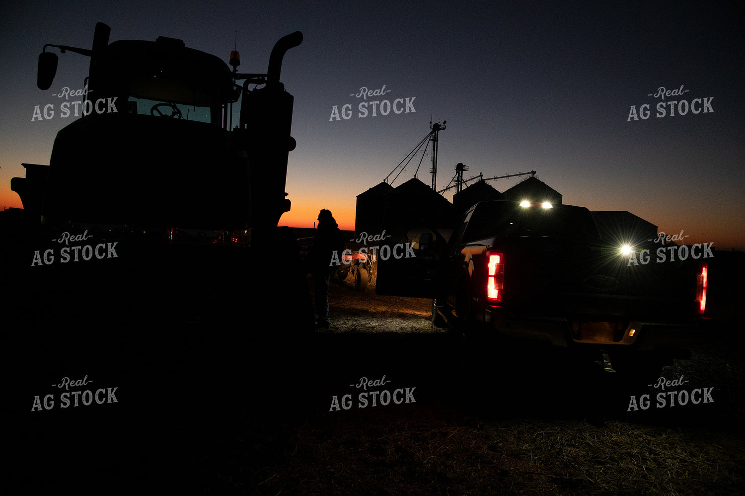 Farmer Preparing Tractor at Sunrise 25855