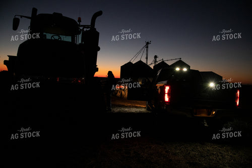 Farmer Preparing Tractor at Sunrise 25855