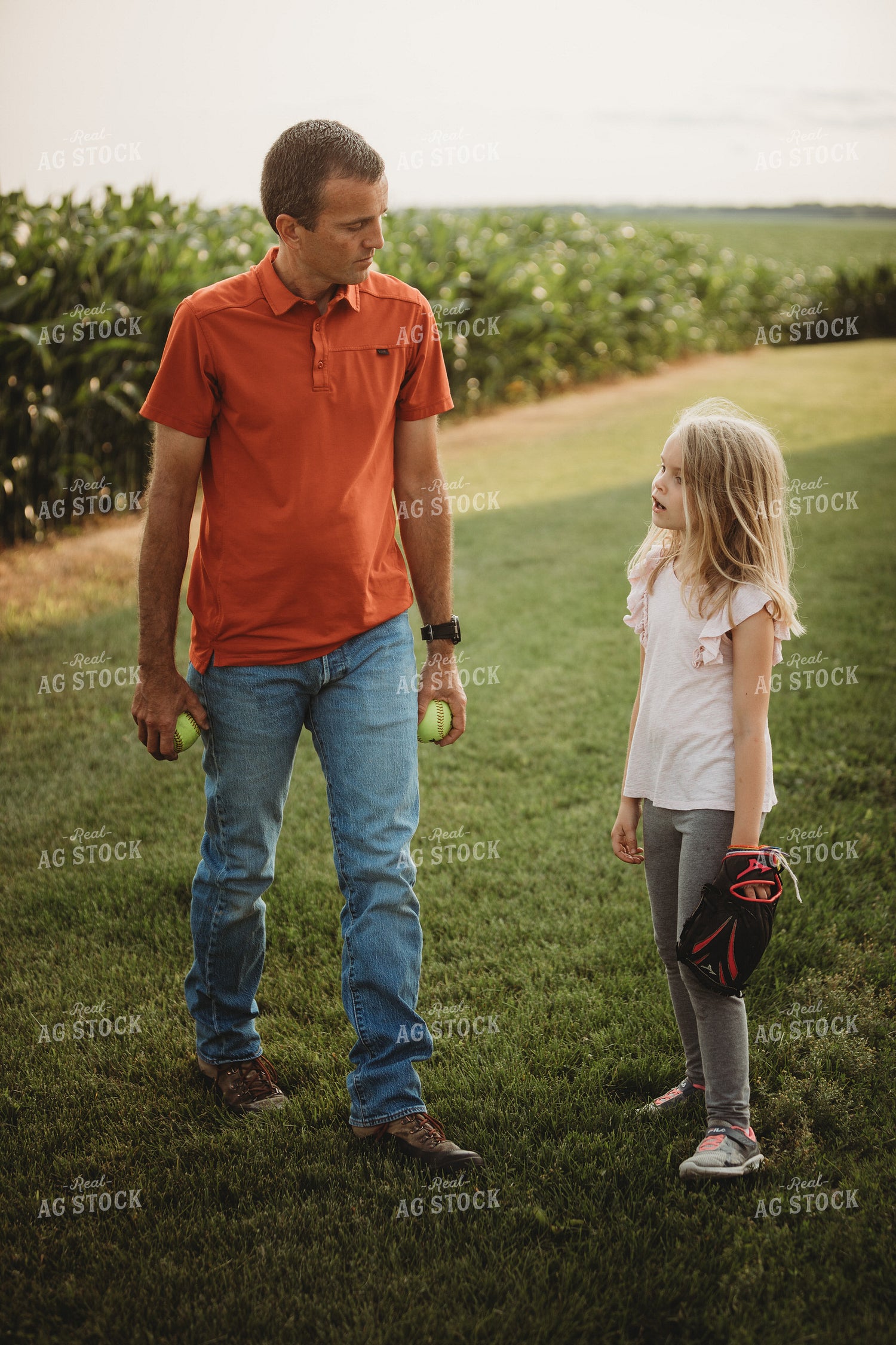 Farm Family Playing Catch Alongside Corn Field 4497
