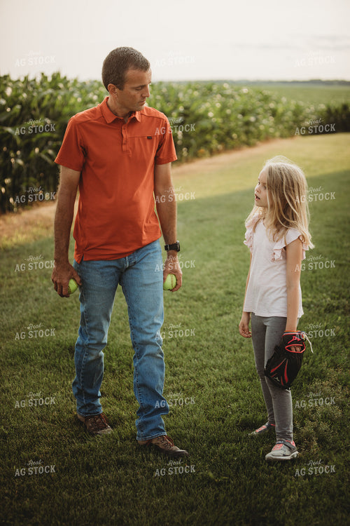 Farm Family Playing Catch Alongside Corn Field 4497