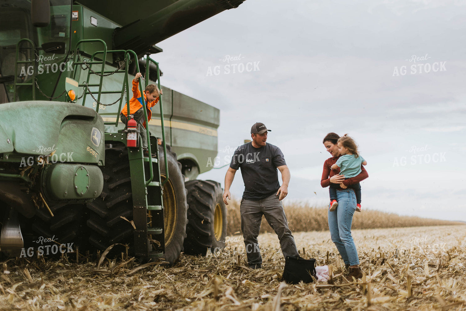 Farm Family Loading Kids into Combine 8565