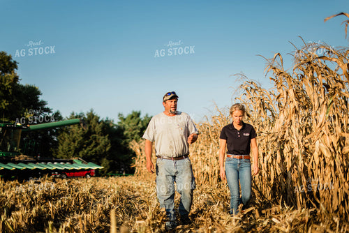 Farmer and Agronomist Walking in Field 8273