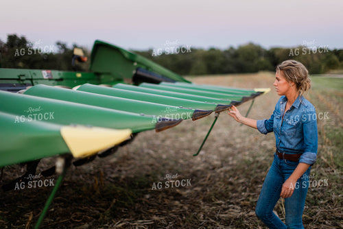 Female Farmer by Fixing Combine Head 8389