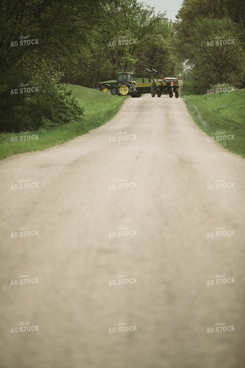 Tractor and Planter Driving Down Road 4016