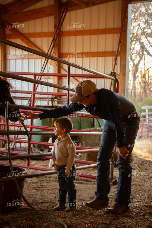 Farmer and Farm Kid in Barn 268121