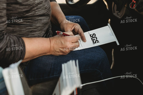 Farmer Filling out Soil Sample Bag 3718