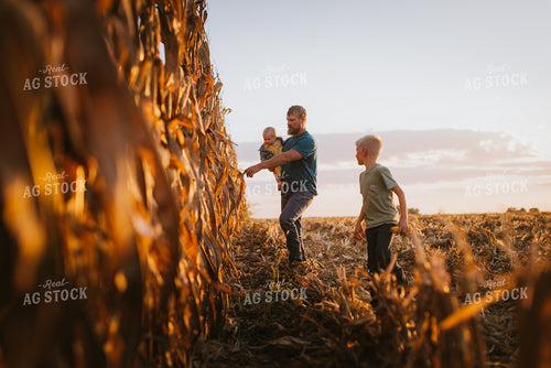 Farmer Checking Corn with Kids 9385