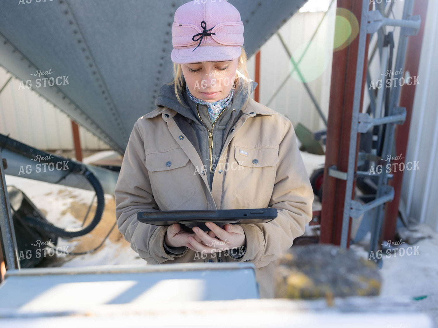 Rancher Looking at Tablet 70210