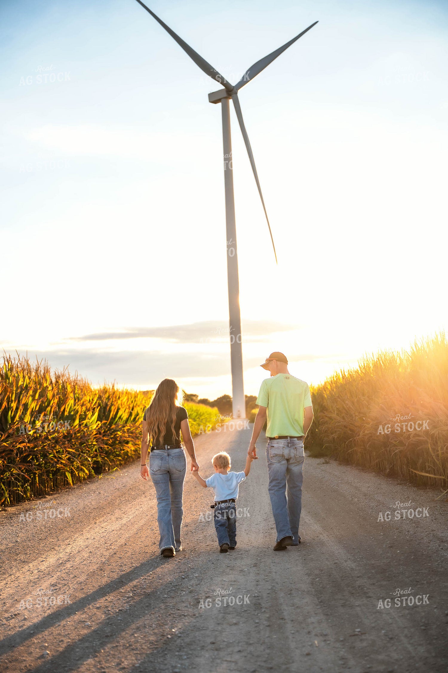 Farm Family Walking by Wind Turbine 115916