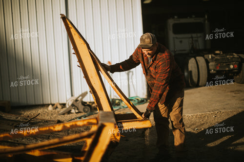 Farmer Working in Yard 6825