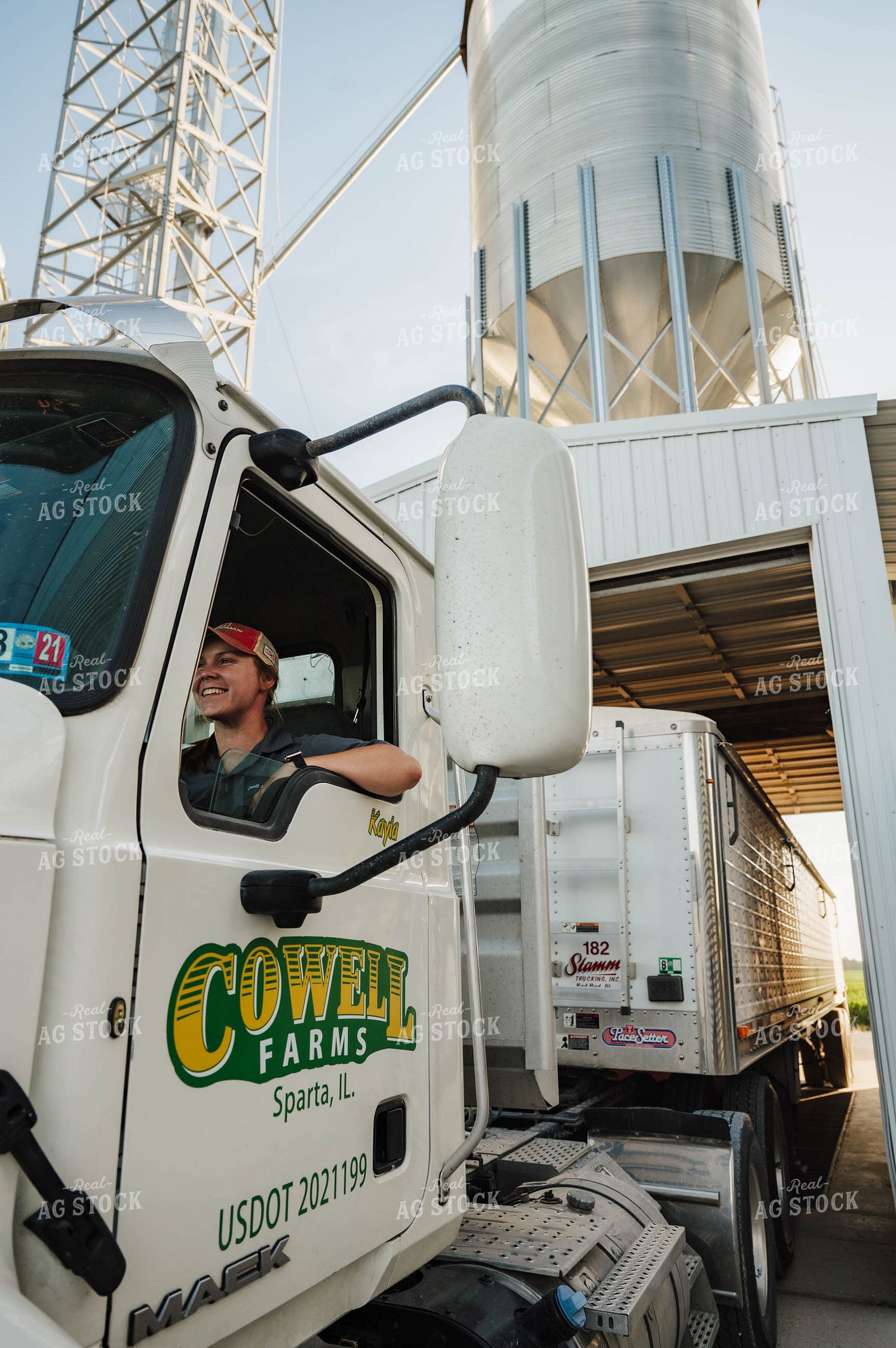Female Farmer Driving Semi 115252