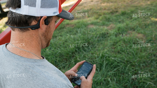 Farmer Using Phone 26089