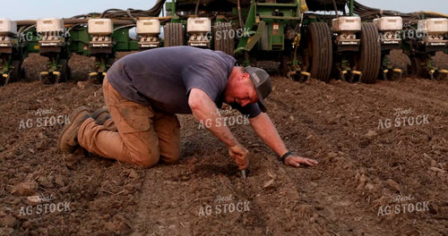 Farmer Checking Seed Depth 6033
