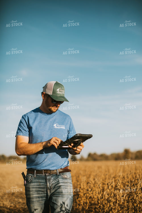 Farmer in Field with Tablet 7186