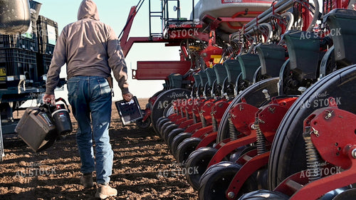 Farmer Preparing for Planting 25209