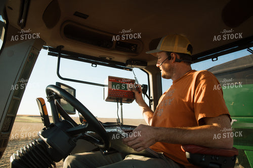 Farmer in Tractor 25998