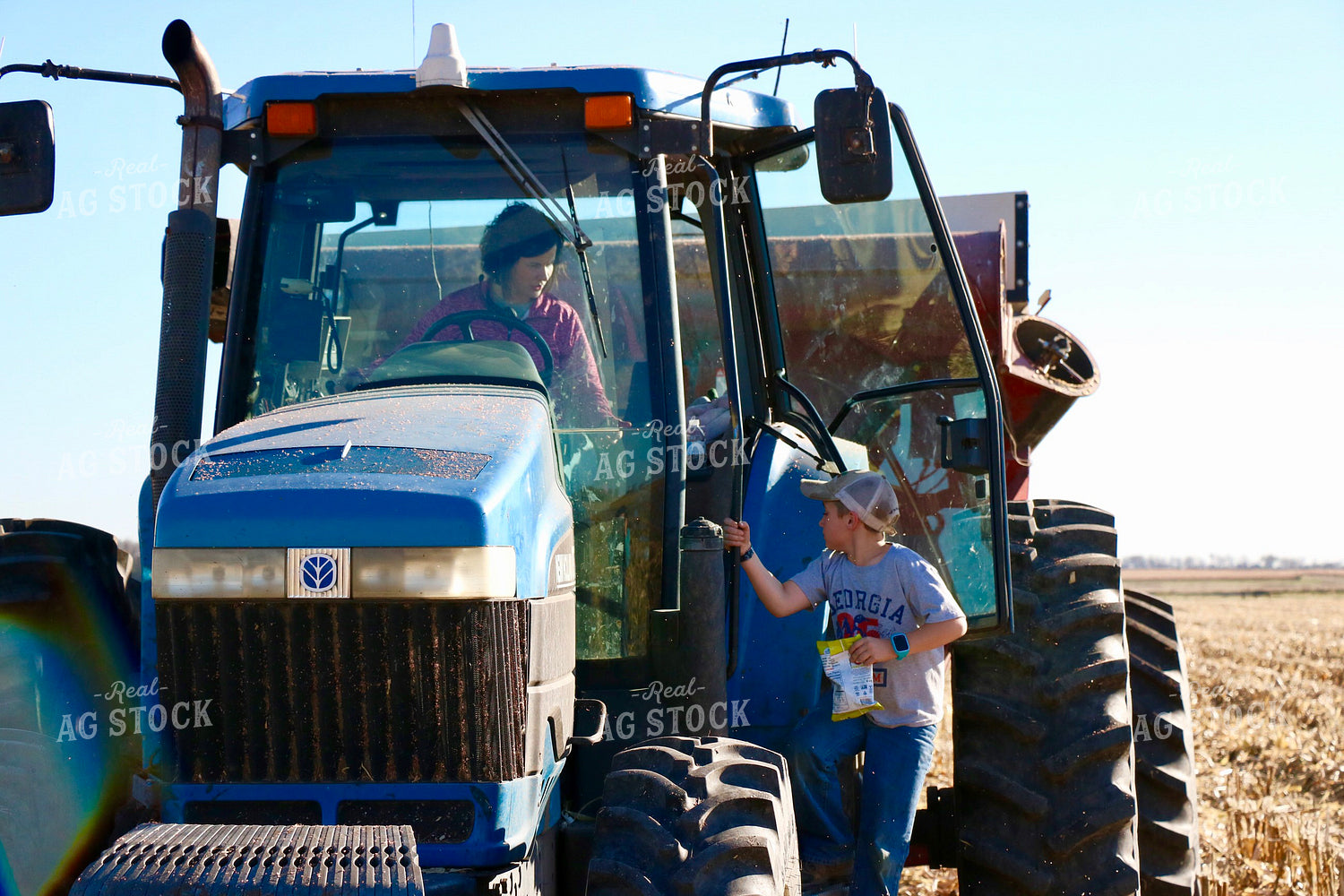 Female Farmer and Farm Kid During Harvest 299218