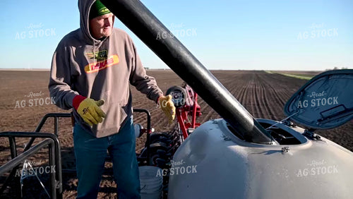 Loading the Planter with the Seed Tender - 080