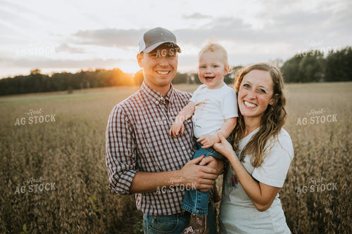 Farm Family Standing in Dried Soybean Field at Sunset 4971