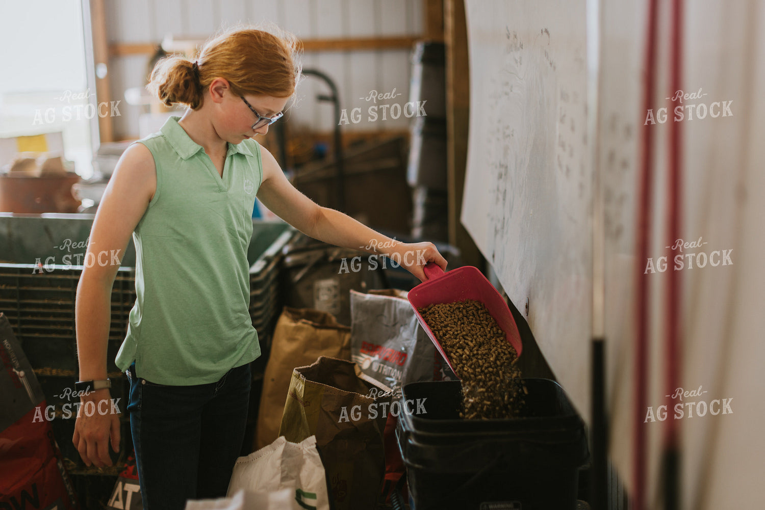 Farm Kid Pouring Feed 7859
