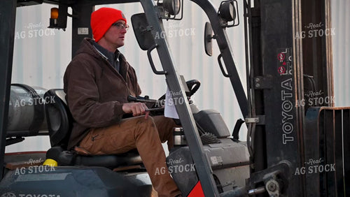 Loading the Seed Tender with a Skidsteer - 113