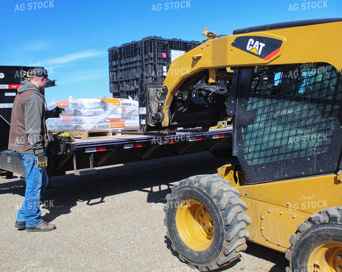 Seed Salesman Unloading Pro Boxes 141223