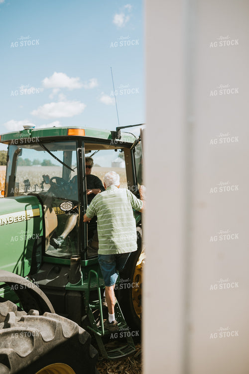 Farmer Grandpa Climbing into Tractor 4721