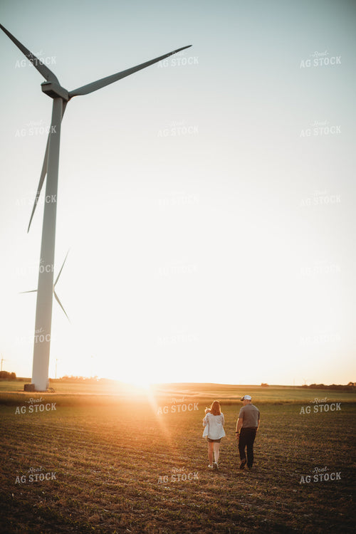 Farm Family Walking in Corn Field with Triticale Cover Crop at Sunset 5926