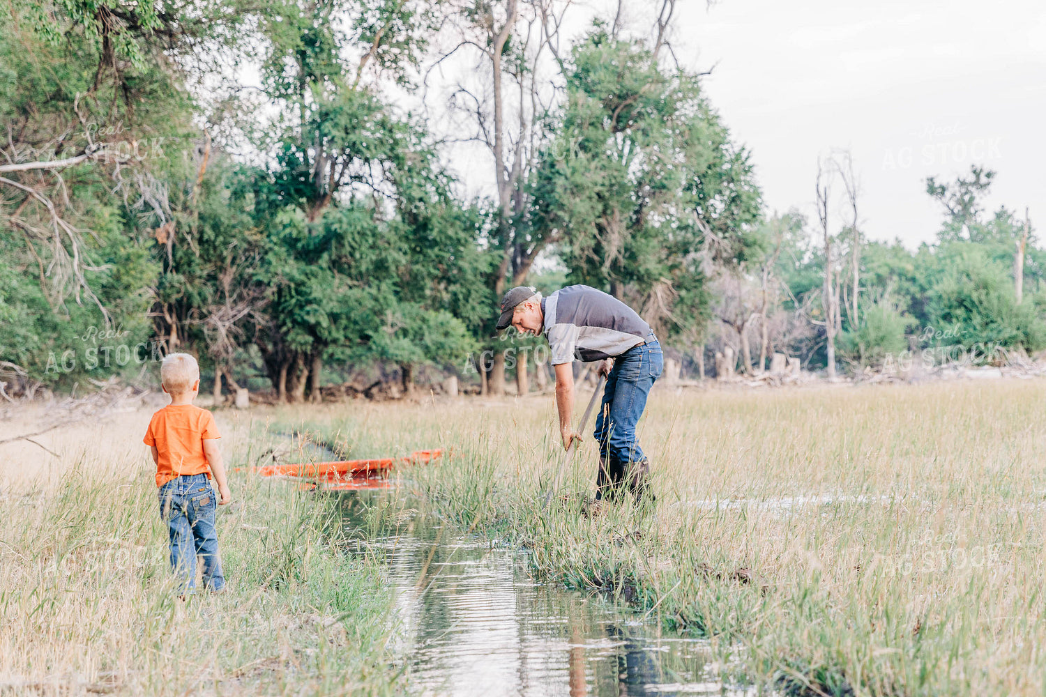 Farm Kid and Farmer with Ditch Irrigation 61033