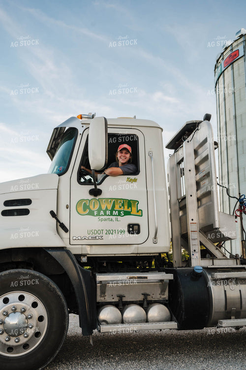 Female Farmer Driving Semi 115293