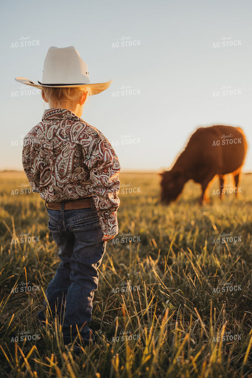 Farm Kid in Cattle Pasture 61123