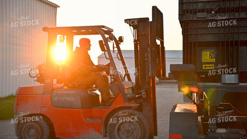 Loading the Seed Tender with the Skidsteer 25323