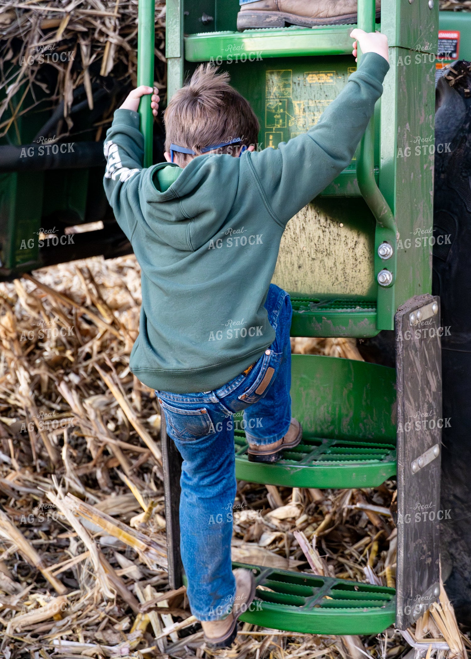 Farm Kid Climbing in Combine 65507