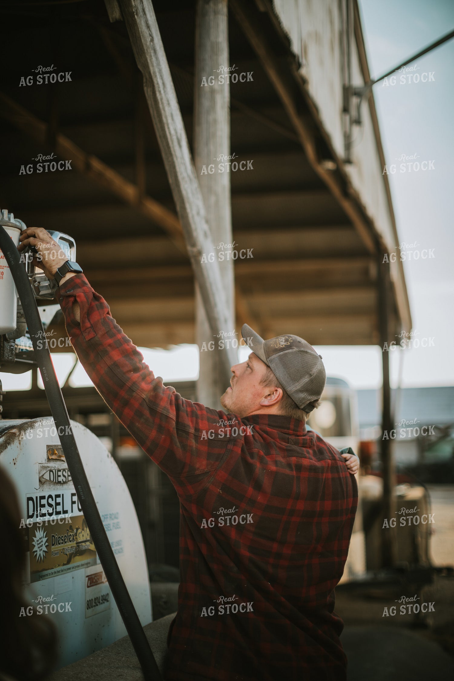 Farmer Fueling Tractor 6843