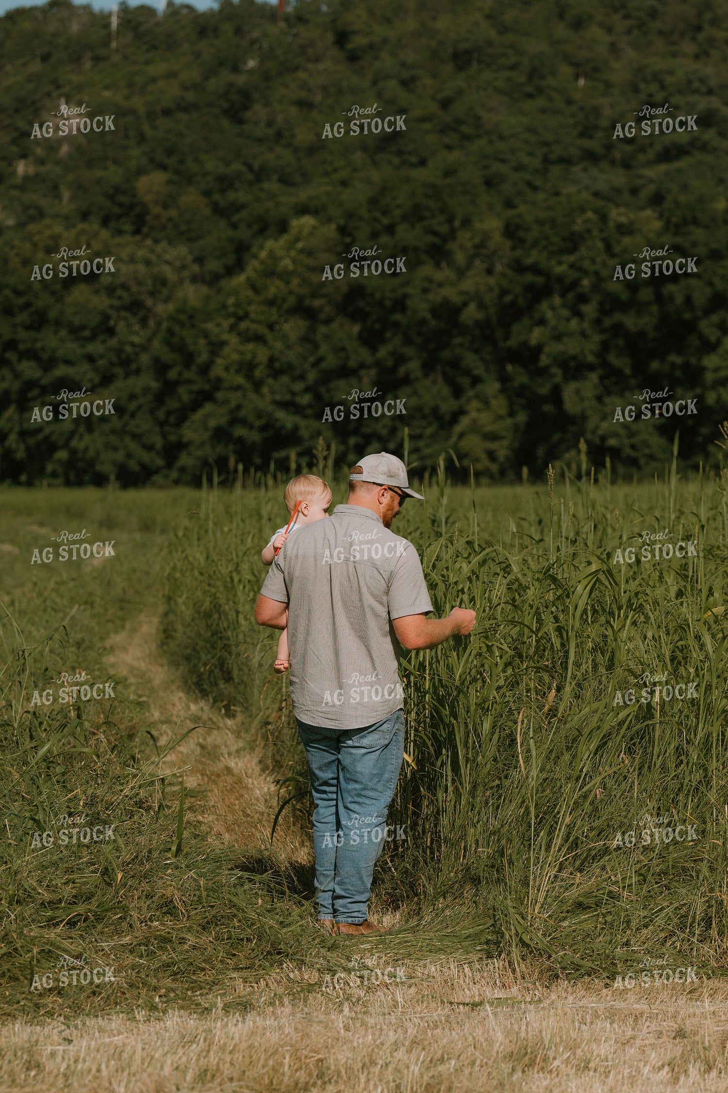 Farmer Checking Crops with Farm Kid 125400