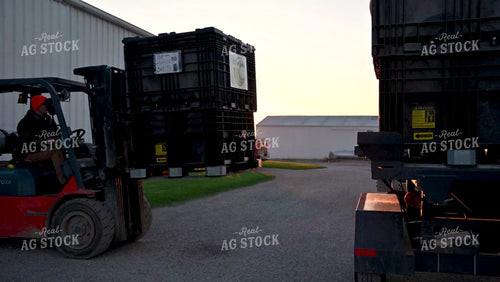 Loading the Seed Tender with a Skidsteer - 119