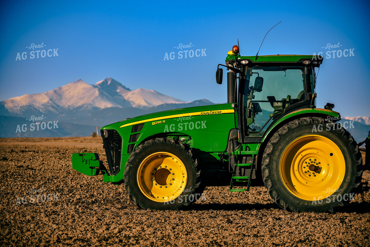 Tractor with Mountains in Background 148014