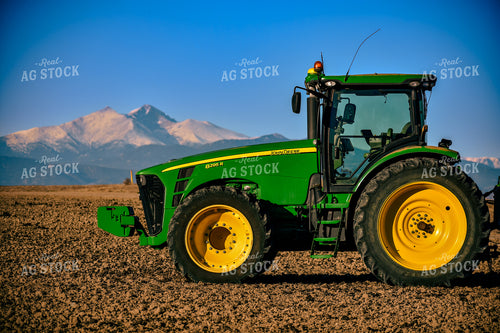 Tractor with Mountains in Background 148014