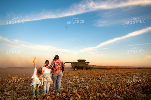 Farm Family Watching Combine 115588