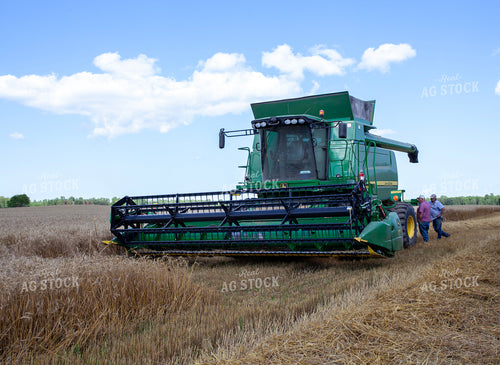 Farmers Talking by Equipment During Wheat Harvest 132070